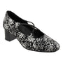 Shoe, Trotters Demi, black with silver floral pattern, low heel, cross-strap and thin instep strap, front view.