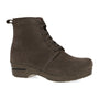 Boot, brown suede, Dansko Sigourney with low wedge heel, lace-up front, visible stitching; supportive sole visible.