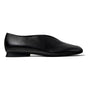 Shoe, black leather Camper Casi Myra Moc Bal slip-on with flat sole, shown in profile on white background.