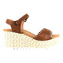 Sandal in tan leather, Naot Blanes, with ankle strap, woven straw platform, cushioned cork-latex footbed.