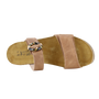 Sandal by Naot in leopard with cork footbed, visible contoured arch support, on white background.