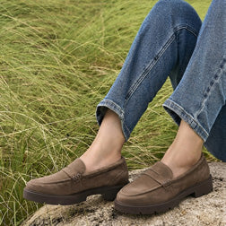 Model wearing Boulevard Loafer Metatarsal in color Coco Creme