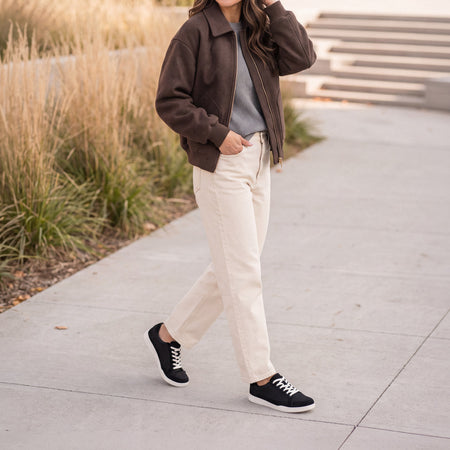 Model wearing Encore Retro Sneaker Metatarsal in color Black