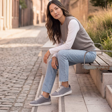 Model wearing Encore Retro Sneaker Metatarsal in color Grey