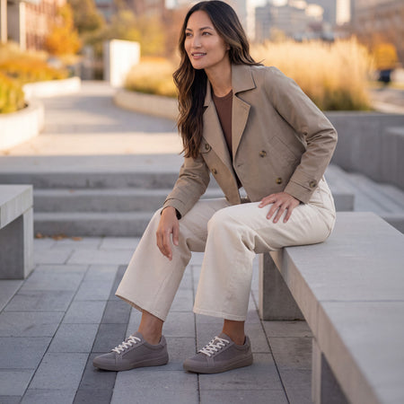 Model wearing Encore Retro Sneaker Metatarsal in color Taupe