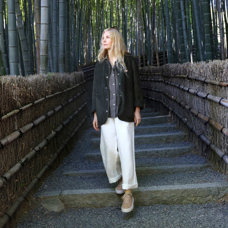 Model wearing Jumpstreet Sneaker Metatarsal in color Cuban Sand Shimmer
