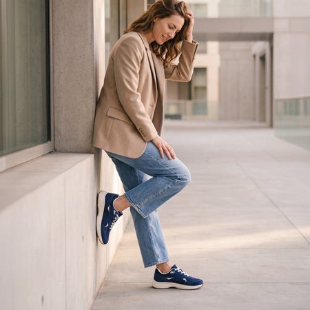 Model wearing Momentum MXV Stride Metatarsal in color Navy