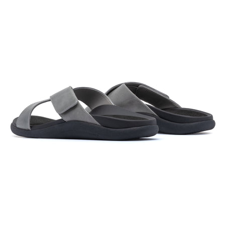 Model wearing Laguna Slide Metatarsal in color Silver Leather