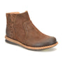 Boot, brown leather, Born Taj brand with visible stitching, textured sole, subtle embossing; supportive and handcrafted.