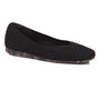 Flat shoe, black knit, Ros Hommerson Niki with cushioned insoles and tortoiseshell-patterned sole, side view.