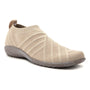 Slip-on shoe; beige knit vegan upper, gray textured sole, removable footbed. Naot Okahu on white background.