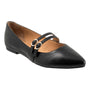 Trotters Emerald black leather flat, pointed toe, cross straps with gold buckles, cushioned footbed, white background.