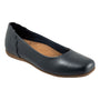 Flat shoe in dark blue leather by The Trotters, scalloped edges, brown sole, shown at an angle on a white background.