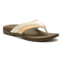 Flip-flop, beige/gold, The Walking Company Balboa Metatarsal with visible arch support, angled on white background.