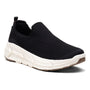 Slip-on shoe by Woolloomooloo, black merino wool upper, white sole, brown outsole accents; lightweight for comfort.