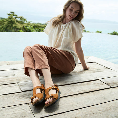 Model wearing Algarve Buckle Metatarsal in color Pecan