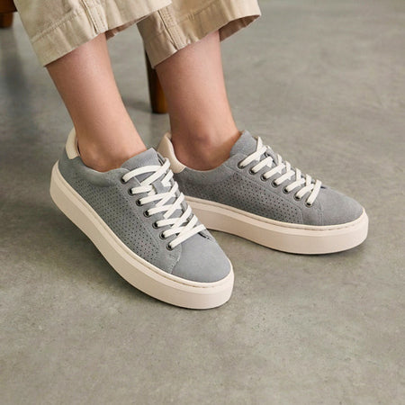 Model wearing Jumpstreet Sneaker Metatarsal in color Dark Grey Suede Perforated