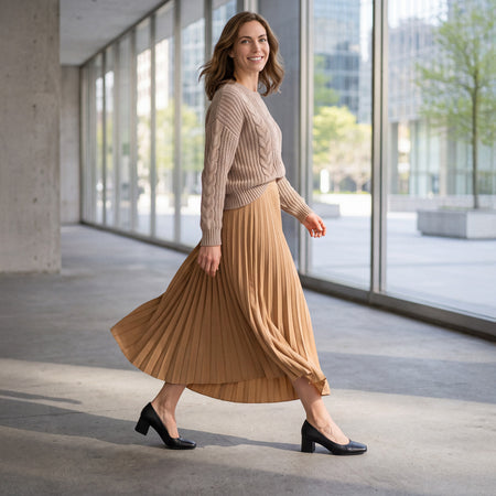 Model wearing Avenue Pump Metatarsal in color Black Nappa