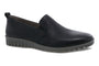 Shoe, black leather Dansko Linley slip-on with gray textured rubber sole, side view on white.