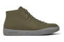 Shoe by Camper: olive green high-top, elastic laces, gray speckled EVA outsoles for cushioning, embossed logo.